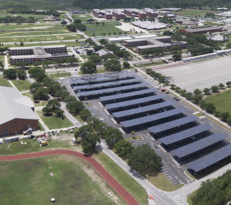 Daytime aerial view of Parris Island Marine Corps base showing solar car port canopies.