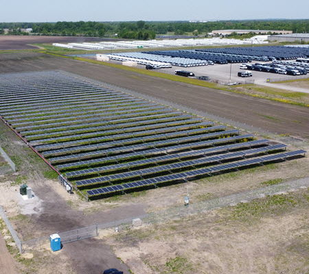 Daytime aerial view of a solar farm at Valmont Industries