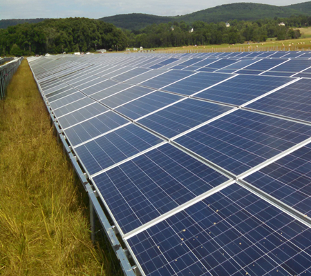 Daytime view of an array of solar panels at Fort Detrick