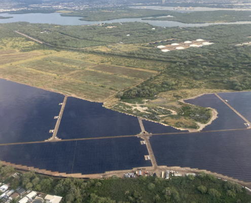 Daytime aerial view of a solar farm in Kupono Hawaii