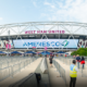 Daytime view of London Stadium featuring an Ameresco banner over the entrance